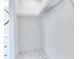 White closet with hanging rods and shelves at 160 174Th Terrace E Dr # A, Redington Shores, FL 33708