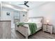 Spacious bedroom with a king-size bed and light wood furnishings at 160 174Th Terrace E Dr # A, Redington Shores, FL 33708