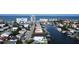 Aerial perspective showcasing the property's location near the ocean and marina at 160 174Th Terrace E Dr # A, Redington Shores, FL 33708