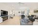 Spacious living area with tile flooring and a comfortable seating arrangement at 15911 Cobble Mill Dr, Wimauma, FL 33598