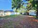 Large, fenced backyard offers privacy and space for gardening or recreation at 2145 68Th S Ave, St Petersburg, FL 33712
