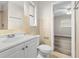 Clean bathroom with a vanity, toilet, shower, and view to bedroom at 2145 68Th S Ave, St Petersburg, FL 33712