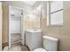 Updated bathroom with vanity, toilet, and view into bedroom at 2145 68Th S Ave, St Petersburg, FL 33712