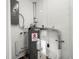 Utility room with water heater and electrical panel at 2145 68Th S Ave, St Petersburg, FL 33712