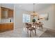 Charming dining area featuring a modern chandelier and elegant decor at 4350 Live Oak Blvd, Palm Harbor, FL 34685