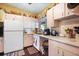 Galley kitchen with ample cabinetry and appliances at 509 Langford Cir, Plant City, FL 33563