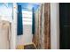 Small bathroom with shower stall and brown curtain at 509 Langford Cir, Plant City, FL 33563