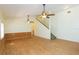 Bright living room with hardwood floors and ceiling fans at 2804 Holloway Rd, Plant City, FL 33567