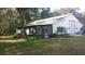 Home with screened porch and large barn at 2804 Holloway Rd, Plant City, FL 33567