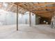Large unfinished workshop with high ceilings and exposed beams at 2804 Holloway Rd, Plant City, FL 33567