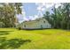 Rear view of the white barn-style workshop at 2804 Holloway Rd, Plant City, FL 33567