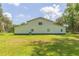 Side view of the white barn-style workshop at 2804 Holloway Rd, Plant City, FL 33567