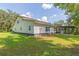 Single story home with a screened porch at 2804 Holloway Rd, Plant City, FL 33567