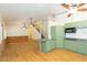 Open concept kitchen and living area with hardwood floors at 2804 Holloway Rd, Plant City, FL 33567