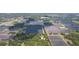 Aerial view of property, showcasing its location near farmlands and residential areas at 2804 Holloway Rd, Plant City, FL 33567