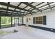 Covered patio with screened enclosure at 2804 Holloway Rd, Plant City, FL 33567