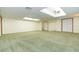 Bright bonus room with skylights and carpet flooring at 2804 Holloway Rd, Plant City, FL 33567