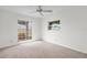 Bright bedroom with carpet and a large window at 2465 Northside Dr # 701, Clearwater, FL 33761