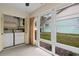 Laundry area with washer, dryer, and built-in shelving at 2465 Northside Dr # 701, Clearwater, FL 33761