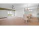 Dining area with a round table and mirrored wall at 2465 Northside Dr # 701, Clearwater, FL 33761