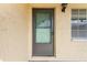 Gray front door with a glass window at 2465 Northside Dr # 701, Clearwater, FL 33761