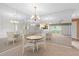 Bright dining area with mirrored walls and a chandelier at 2465 Northside Dr # 701, Clearwater, FL 33761