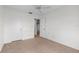Spacious bedroom with neutral carpeting and ceiling fan at 2465 Northside Dr # 701, Clearwater, FL 33761