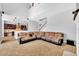 Open living room, kitchen, and stairs view at 8703 Alafia Hills Dr, Plant City, FL 33567