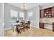 Bright breakfast nook with built-in desk and view at 8703 Alafia Hills Dr, Plant City, FL 33567