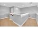 Upper hallway with carpeted floors and neutral walls at 8703 Alafia Hills Dr, Plant City, FL 33567