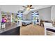 Bedroom with a desk, bookshelf, and window at 8703 Alafia Hills Dr, Plant City, FL 33567