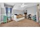 Charming bedroom with built-in shelving and a daybed at 8703 Alafia Hills Dr, Plant City, FL 33567