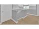 Upper hallway with carpeted floors and neutral walls at 8703 Alafia Hills Dr, Plant City, FL 33567