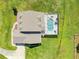 Aerial view of house, pool, and expansive backyard at 8703 Alafia Hills Dr, Plant City, FL 33567