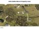 Aerial map highlighting property lines and surrounding area at 8703 Alafia Hills Dr, Plant City, FL 33567