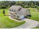 Aerial view of a two-story house with a pool at 8703 Alafia Hills Dr, Plant City, FL 33567