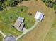 Aerial view showing house, barn, pool, and large lot at 8703 Alafia Hills Dr, Plant City, FL 33567