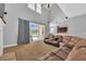 Living area with pool view and sliding doors at 8703 Alafia Hills Dr, Plant City, FL 33567