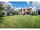 Spacious backyard with large grassy area at 20270 Merry Oak Ave, Tampa, FL 33647