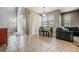 Bright dining area with tile floors and access to the back patio at 20270 Merry Oak Ave, Tampa, FL 33647