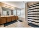 Bathroom with double vanity, garden tub, and shower at 20270 Merry Oak Ave, Tampa, FL 33647