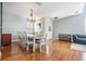 Elegant dining room with hardwood floors and a chandelier at 20270 Merry Oak Ave, Tampa, FL 33647