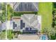 Aerial view of house with solar panels on roof at 20270 Merry Oak Ave, Tampa, FL 33647