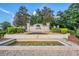 Community entrance with attractive landscaping and water feature at 20270 Merry Oak Ave, Tampa, FL 33647