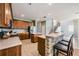 Modern kitchen with island, stainless steel appliances and breakfast bar at 20270 Merry Oak Ave, Tampa, FL 33647