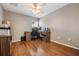 Home office with wood floors and built-in desk at 20270 Merry Oak Ave, Tampa, FL 33647