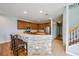 Kitchen with island and stone facade breakfast bar at 20270 Merry Oak Ave, Tampa, FL 33647