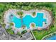 Resort-style pool with lap lanes, water features, and ample lounge space at 20270 Merry Oak Ave, Tampa, FL 33647