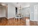 Elegant dining room with hardwood floors and a chandelier at 20270 Merry Oak Ave, Tampa, FL 33647