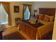 Main bedroom with a king-size bed and plenty of natural light at 197 Philadelphia Blvd # 26, Palm Harbor, FL 34684